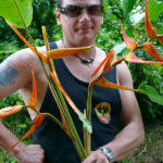 Un regalo! We had the mac daddiest of flower bouquets after this road trip! Photo of Julio giving me a bouquet of bird of paradise flowers.