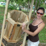 Very excited about the trash cans in Pavones after our trip to trash-ridden Panama City Photo of me holding a trash can.