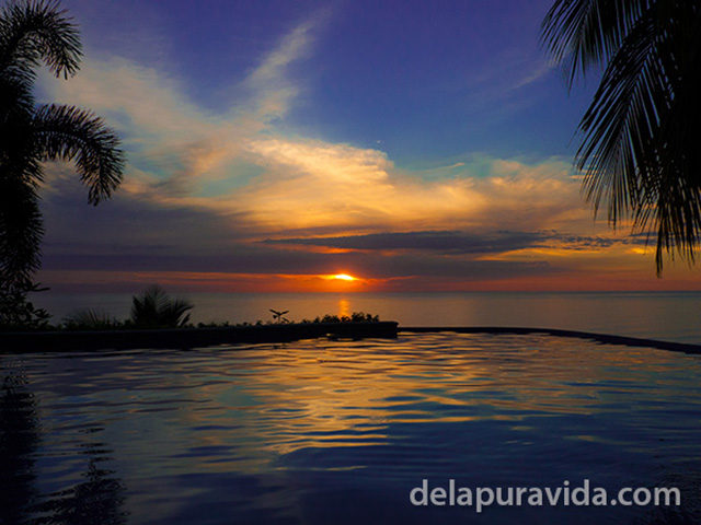 costa rica sunset and infinity pool