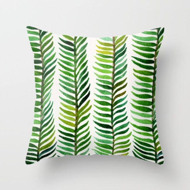 Hand painted watercolor seaweed design on a pillow produced by Society6.